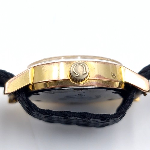 981 - Star Lot : A beautiful designer Omega Geneve Swiss made ladies wristwatch with black woven strap. Se... 