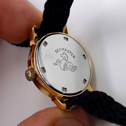 981 - Star Lot : A beautiful designer Omega Geneve Swiss made ladies wristwatch with black woven strap. Se... 