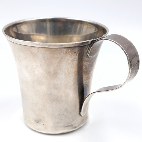 994 - A sterling silver antique cup with handle. Weight 88.07 grams. With hallmarks to base.