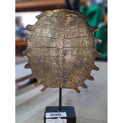 606 - Star Lot : An elegant polished bronze, organic, freestanding sculpture in the form of a turtle shell... 