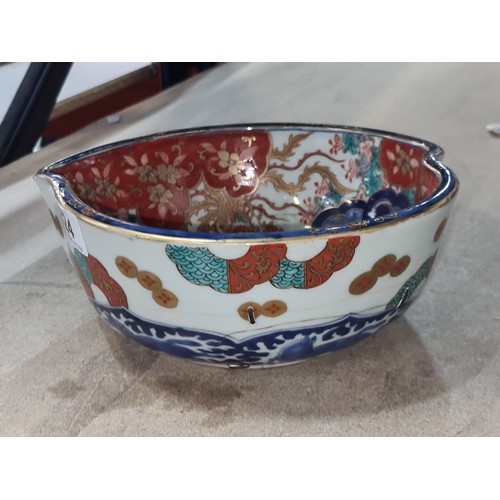 624 - Star Lot : An incredible example of an antique Japanese Imari bowl featuring the classic orange, blu... 