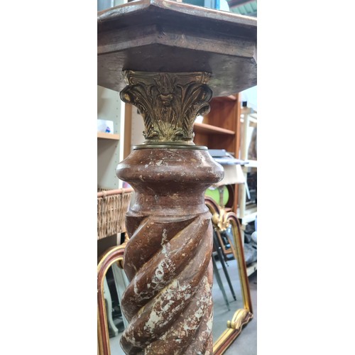 366 - Star Lot A pair of cold Italian marble and gilt brass columns each featuring an octagonal top, Twist... 