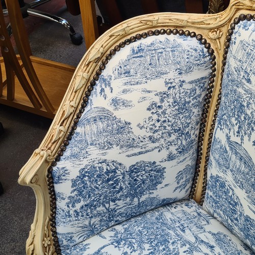 370 - Star Lot : A classic Louis XV style toile de Jouy blue & beige two seater. Gorgeous piece making sur... 