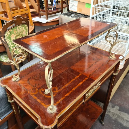 351 - Star Lot : A fabulous antique style French ormolu mounted tea serving table, in the opulent Louis XV... 