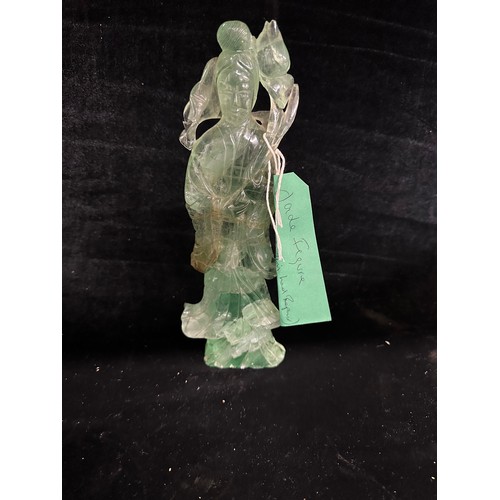 641 - Star Lot : A nice antique Chinese carved figure of Guanyin in green jade. Dimensions: H - 16 cms, W ... 