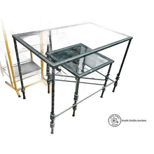 409 - Two Glass top and wrought iron tables. Including a dining table and side table. Featuring decorative... 