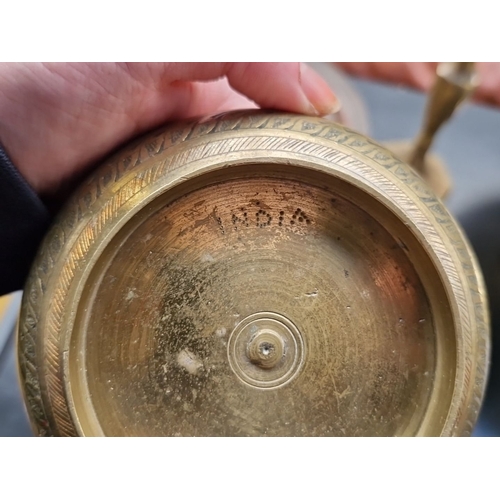 419 - Collection of Indian brassware includes candle holder, footed bowl, small bowl, round tray, and dish... 