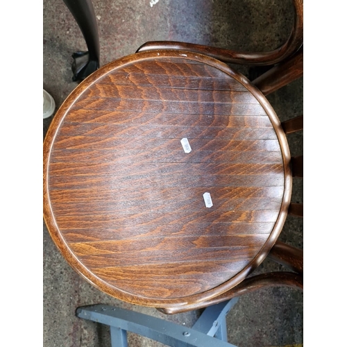 425 - A gorgeous early 20th century Bentwood chair.  Has an elegant curved design and grain to wood.