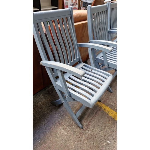 426 - Set of three blue painted wooden folding garden chairs, featuring slatted design with armrests.