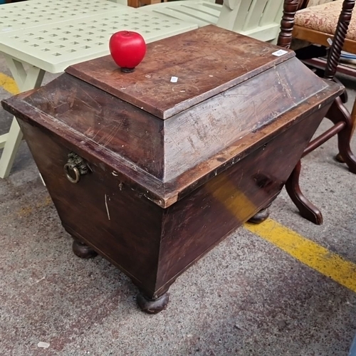 437 - Star Lot : A Georgian Jamaican Mahogany cellarette, with original brass handles and fitted interior.... 