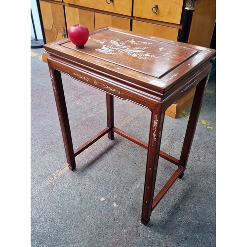 446 - A charming vintage Chinese rose wood side table with mother-of-pearl floral inlay, featuring Asian m... 