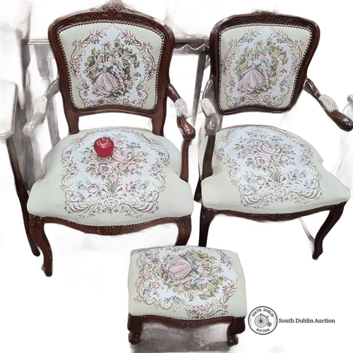 454 - Set of two carved mahogany armchairs and footstool with tapestry upholstery. Approximately chairs: 3... 