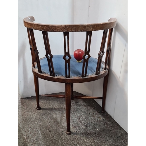 457 - Star Lot : Mahogany corner chair with geometric back design, upholstered in blue fabric. Approximate... 