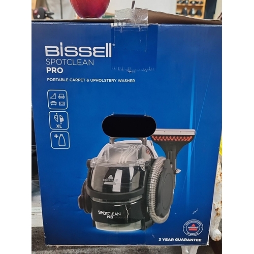 459 - Bissell SpotClean Pro is a portable carpet and upholstery washer. It comes with original packaging a... 