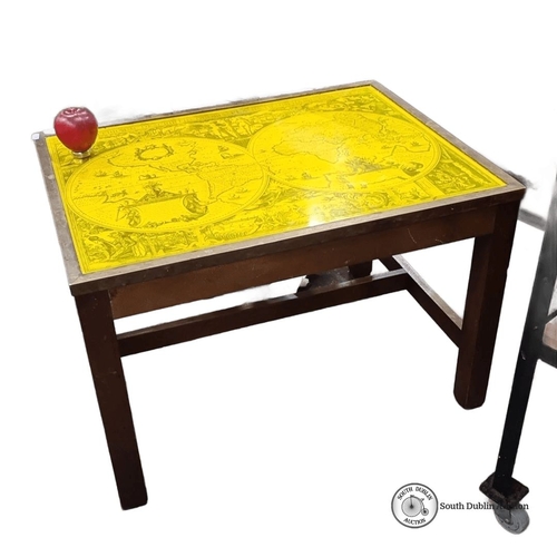 460 - A wooden table with vintage world map design on yellow laminated top. Approximately 18 inches high, ... 