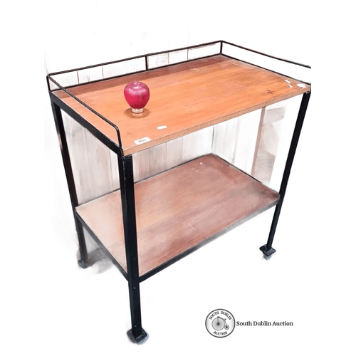 461 - A wooden mid century trolley with iron frame, approximately 80 cm high, 70 cm wide, 44 cm deep. Feat... 