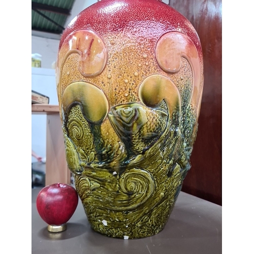 462 - An antique Bretby floor vase in a majolica style featuring underwater scenes. Base marked Bretby and... 