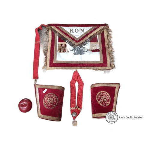 480 - An interesting Regalia set which includes an embroidered velvet apron, sash, and cuffs, adorned with... 