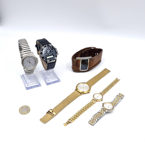 32 - A collection of six assorted watches. Including a Calvin Klein example.