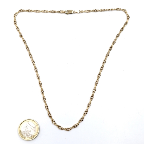 49 - Star Lot : A nine carat gold (375) chain link necklace. Length - 46 cms. Weight - 5.47 grams.