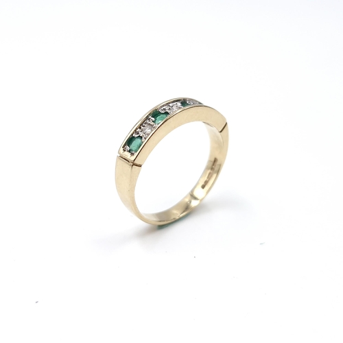 6 - Star Lot : A 9ct gold half eternity four stone emerald  and diamond ring. Size - K 1/2. Weight - 2.4... 