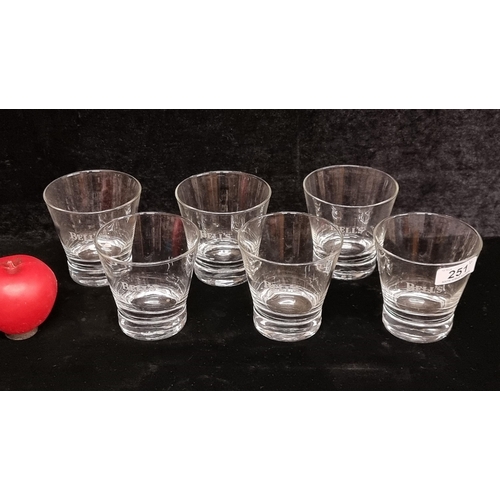 251 - A set of six Bell's whiskey tumbler glasses. All in good condition.