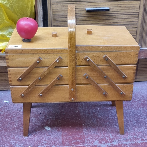 368 - A fabulous vintage bi-folding sewing box in lovely original condition.