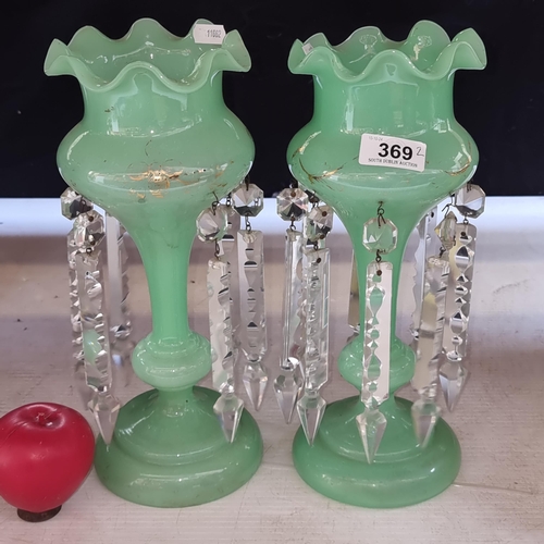 369 - A pair of antique Victorian mint green lusters. Both in good condition.