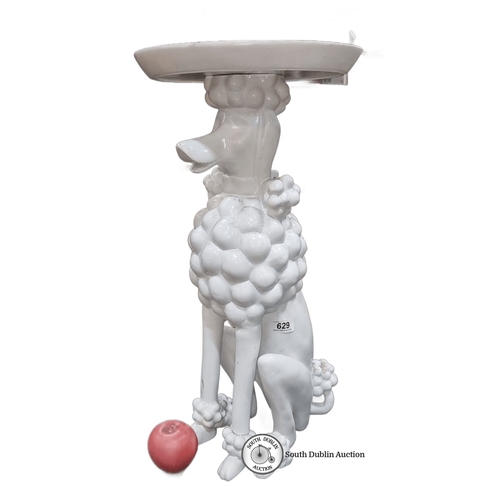 629 - White ceramic Kare Design poodle sculpture table. Approximately 24 inches tall. It's a bit poodle an... 