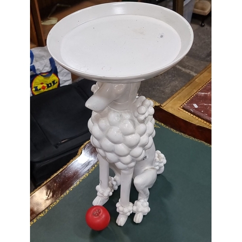 629 - White ceramic Kare Design poodle sculpture table. Approximately 24 inches tall. It's a bit poodle an... 