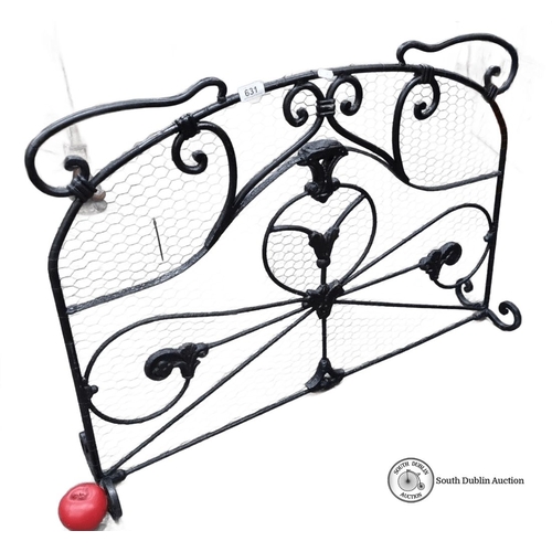 631 - Star Lot : A heavy Wrought iron fireplace screen with intricate scrollwork design. Approximately 70c... 