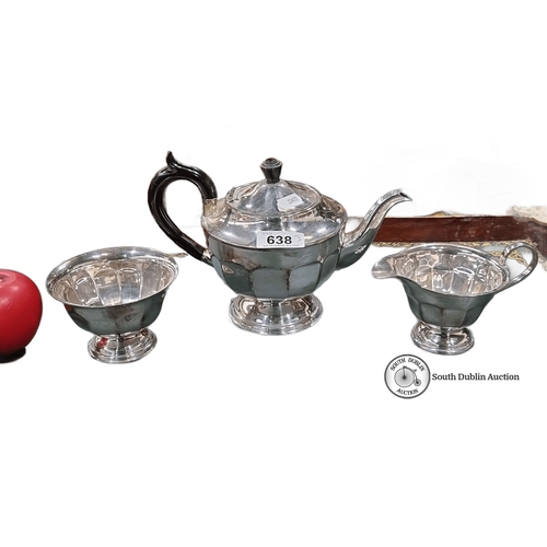 638 - Sheffield silver-plated tea set, including teapot, sugar bowl, and creamer. Approximately six-cup ca... 