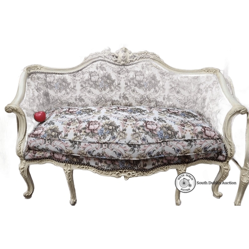 651 - Star lot : A Stunning Settee with floral upholstery and carved cream wood frame. Approximately 180 c... 