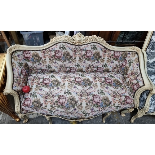 651 - Star lot : A Stunning Settee with floral upholstery and carved cream wood frame. Approximately 180 c... 