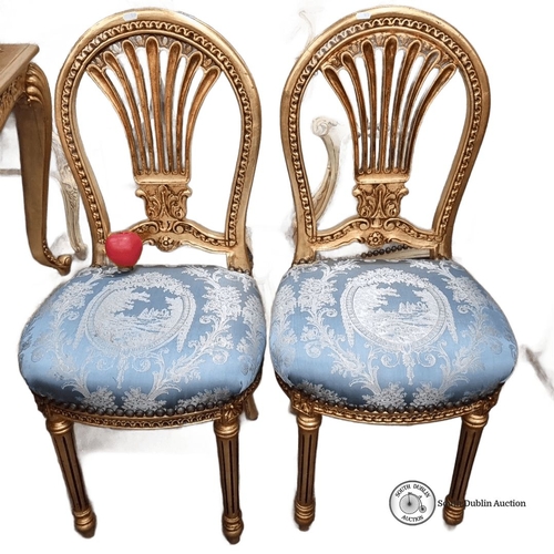 655 - Star lot : A fine pair of French Louis XVI-style giltwood chairs with blue patterned upholstery. App... 