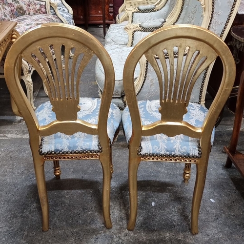 655 - Star lot : A fine pair of French Louis XVI-style giltwood chairs with blue patterned upholstery. App... 