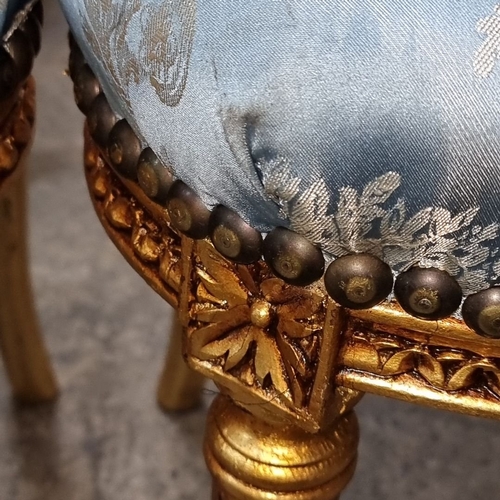 655 - Star lot : A fine pair of French Louis XVI-style giltwood chairs with blue patterned upholstery. App... 