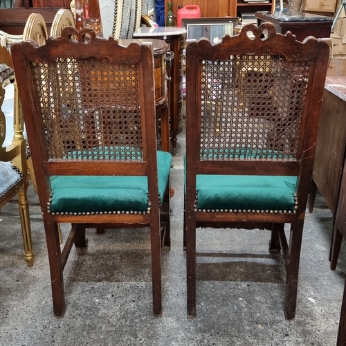 659 - Star Lot : Pair of British Regency-style carved  chairs with caned backs and green upholstered seats... 