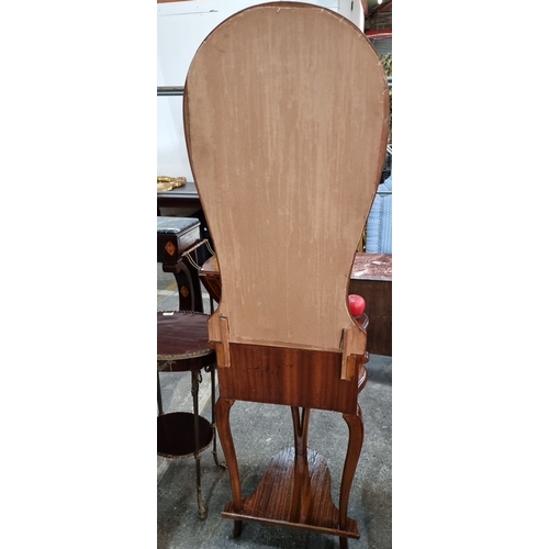 660 - Star Lot : A stunning Art Nouveau vanity mirror stand in rich mahogany and burr Walnut. with two dra... 