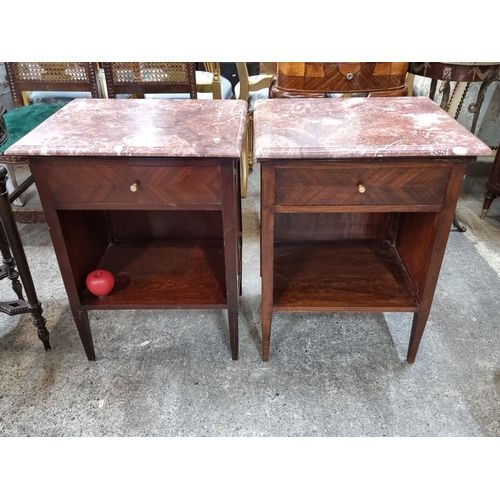 673 - Star Lot : A super pair of Art Deco bedside tables featuring rich mahogany wood and cold Italian mar... 