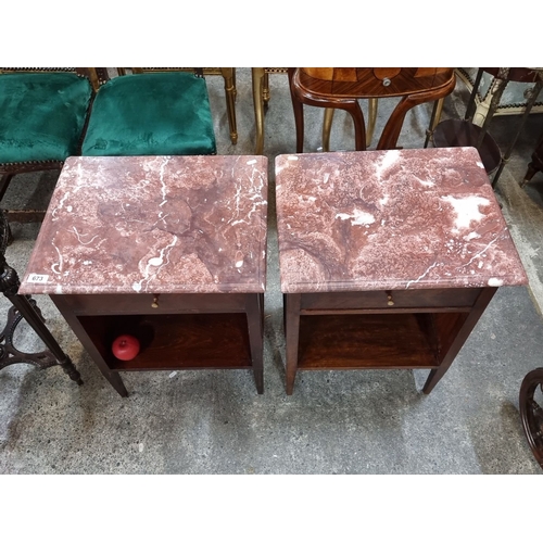 673 - Star Lot : A super pair of Art Deco bedside tables featuring rich mahogany wood and cold Italian mar... 