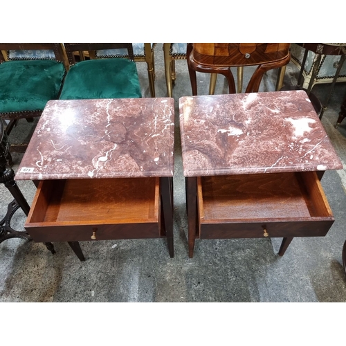 673 - Star Lot : A super pair of Art Deco bedside tables featuring rich mahogany wood and cold Italian mar... 