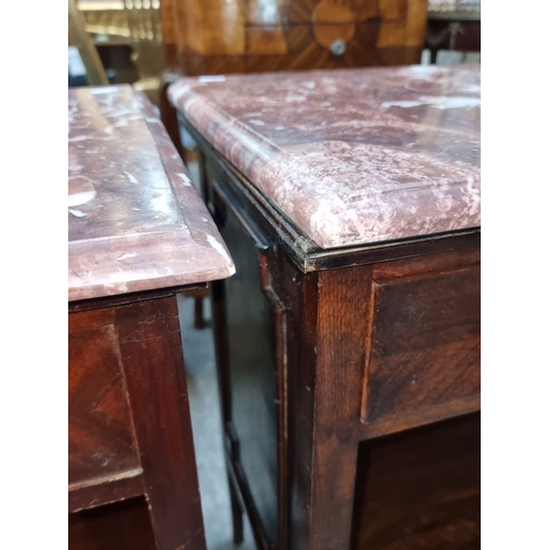 673 - Star Lot : A super pair of Art Deco bedside tables featuring rich mahogany wood and cold Italian mar... 