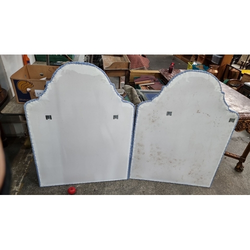 676 - Pair of upholstered twin headboards in a blue patterned fabric. Approximately 42 inches wide and 50 ... 