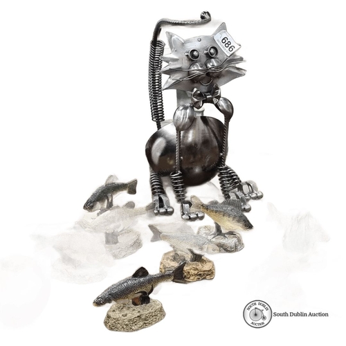 686 - Metal cat sculpture with nine resin fish figurines, including 