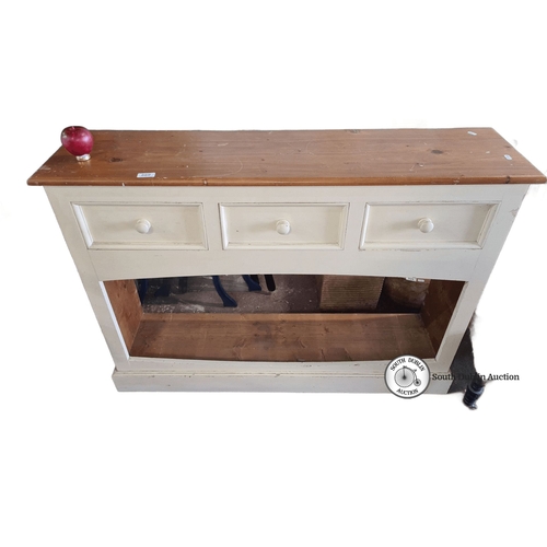 869 - Pine kitchen console with cream painted finish, featuring three drawers. Approximately 80cm high, 12... 