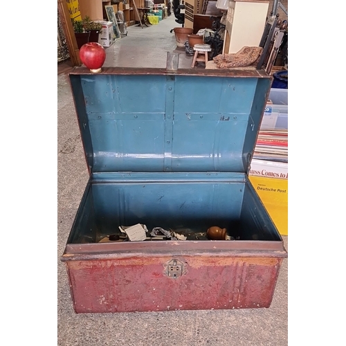 875 - Antique metal trunk with rustic patina and a domed lid. Approximately 36