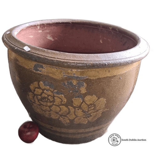 879 - Large ceramic planter with floral decoration in brown and gold tones. Approximately 45 cm in diamete... 