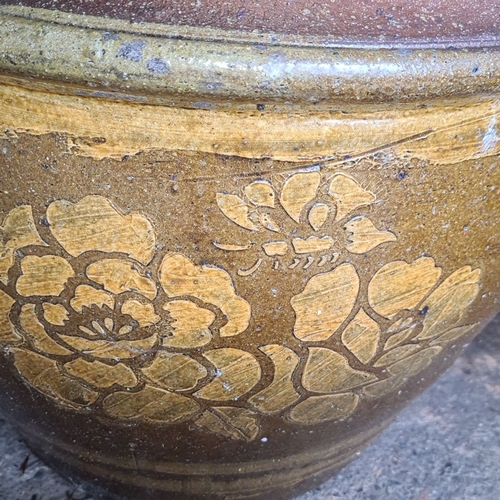 879 - Large ceramic planter with floral decoration in brown and gold tones. Approximately 45 cm in diamete... 