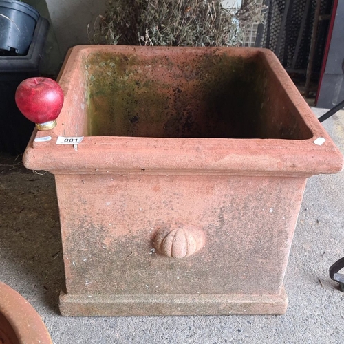 881 - A large Terracotta square planter with decorative detailing. Approximately 18 inches in height, 20 i... 